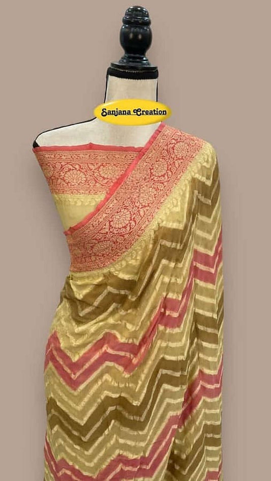 Mannequin-draped multicolor chiffon saree in gold with pink and green zigzag chevrons
