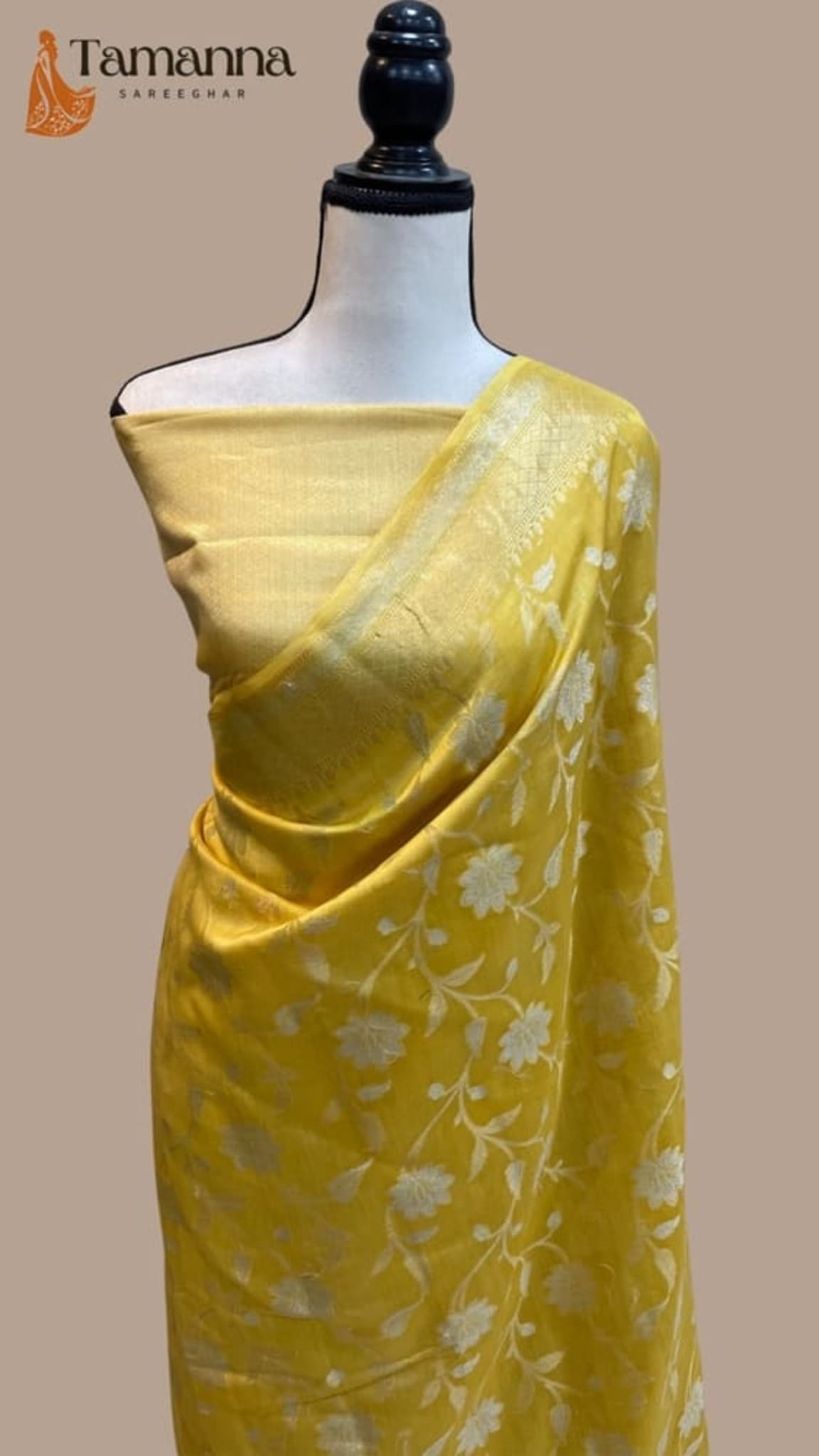 Mustard Banarasi saree with allover floral butta pattern and draped pallu