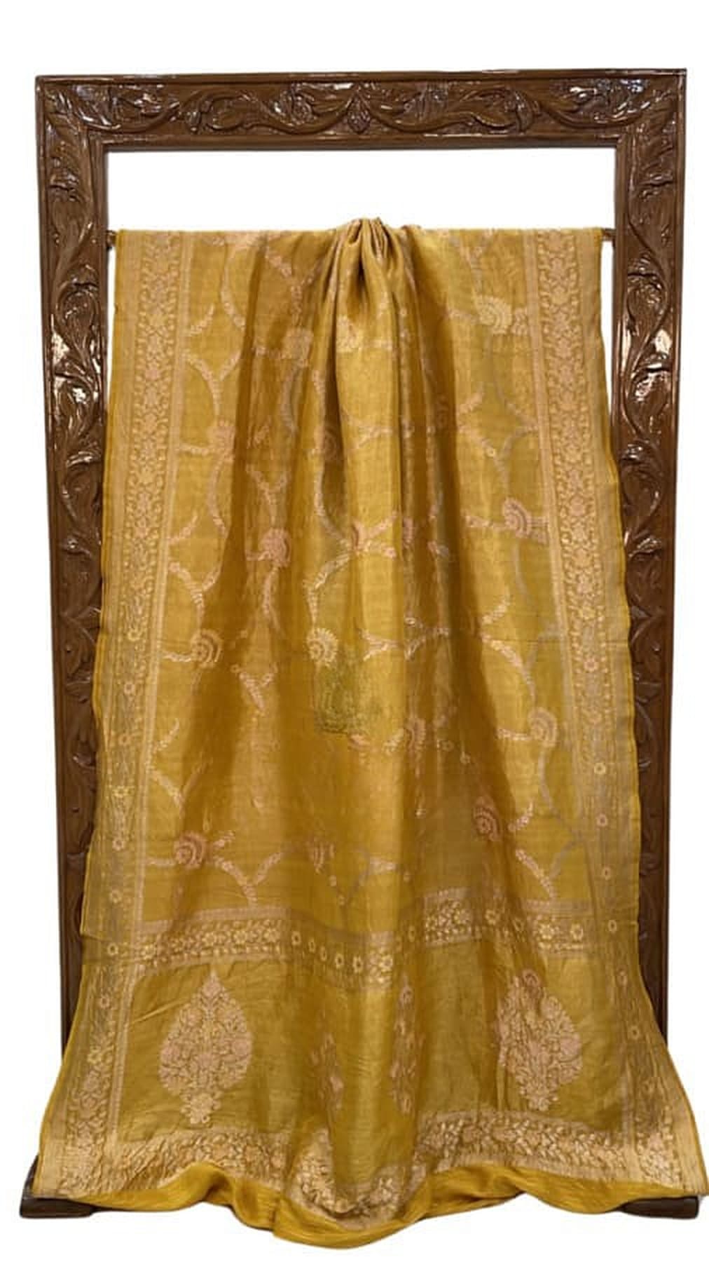 Mustard yellow Banarasi saree with gold brocade motifs and central drape