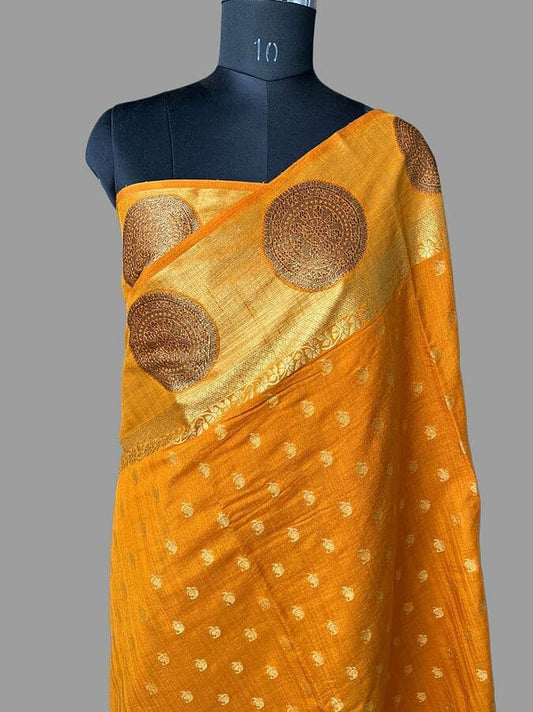 Mustard yellow silk saree with gold zari pallu and circular medallion design
