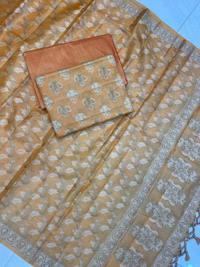Banarasi silk saree with silver floral motifs, zari border and folded matching blouse piece