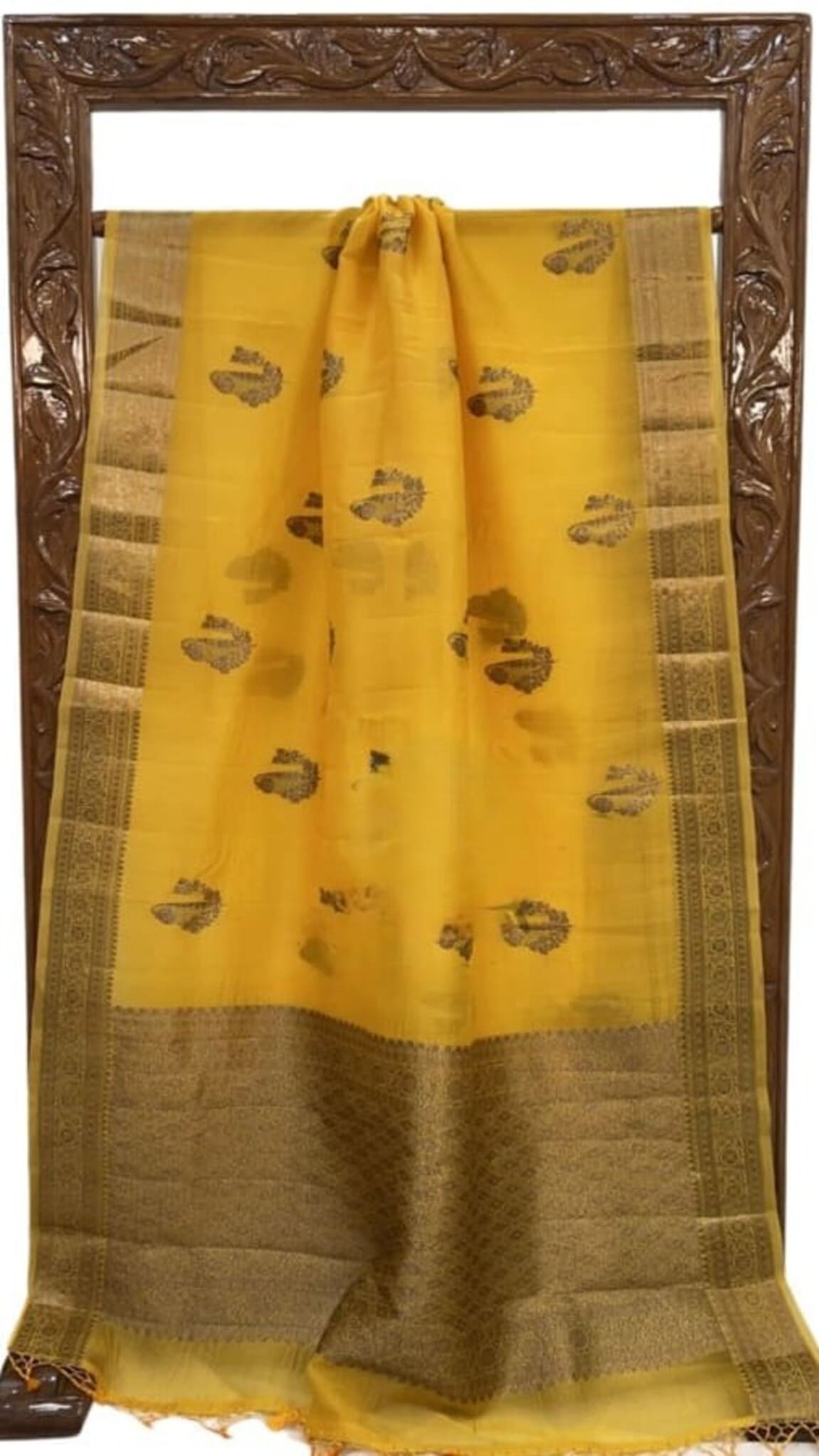 Mustard yellow Banarasi saree folded view with gold border and leaf motif all over