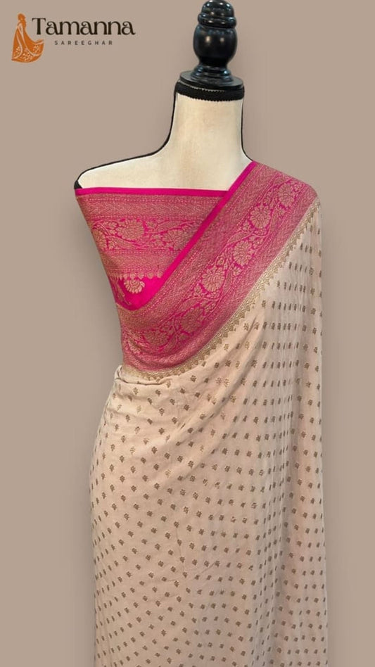 Off-white saree with magenta pallu and woven pattern border