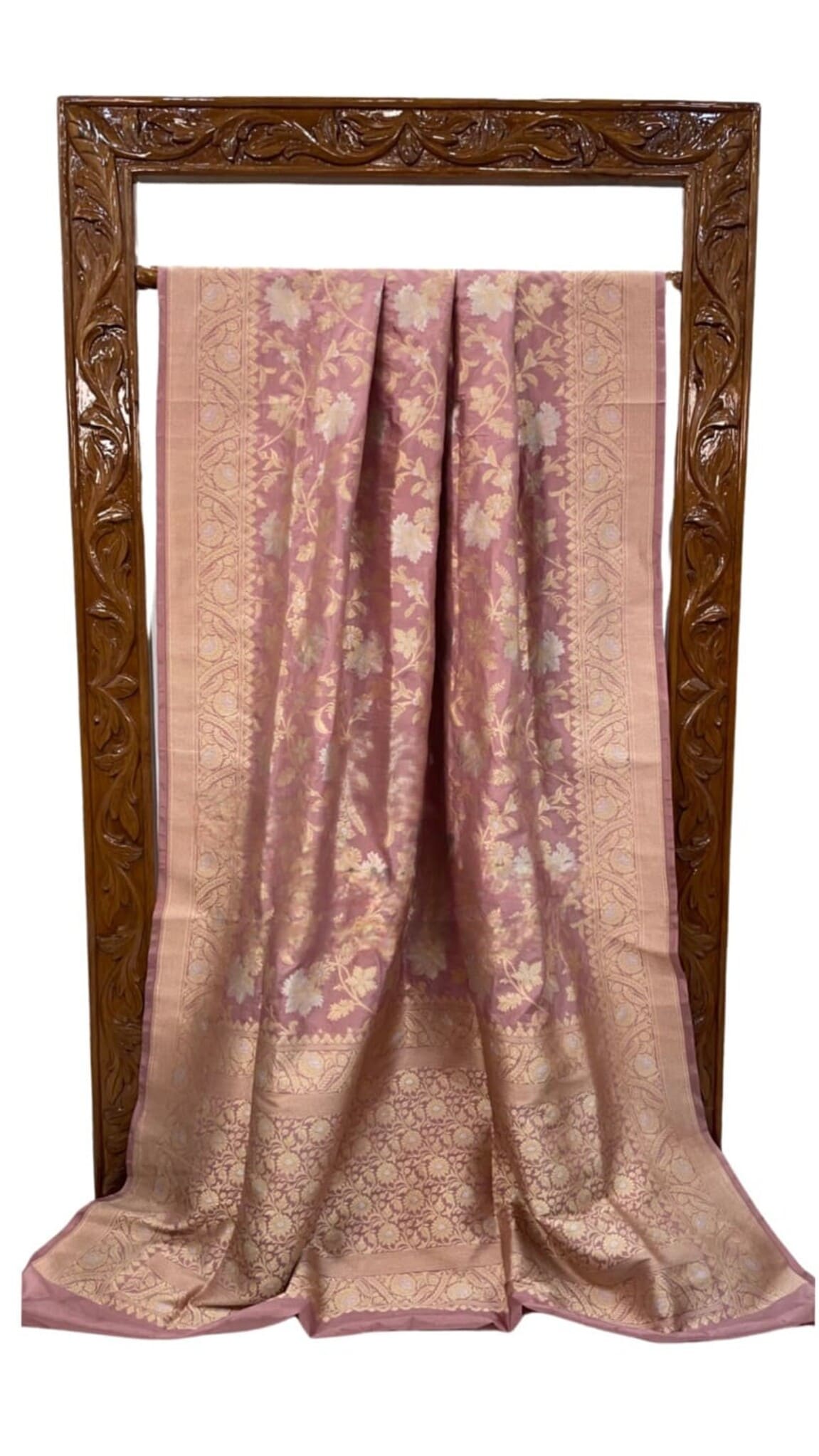 Pink silk saree with gold-toned jaal motifs and border, fully visible front