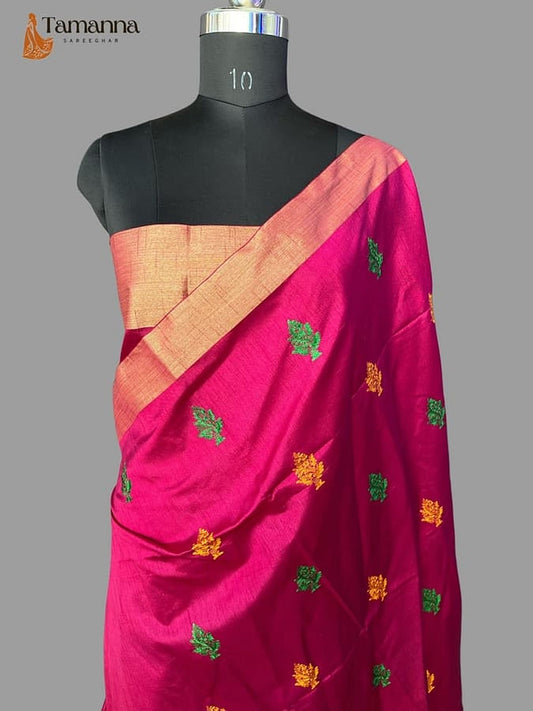 Pink silk saree with beige diagonal border and green/gold motifs