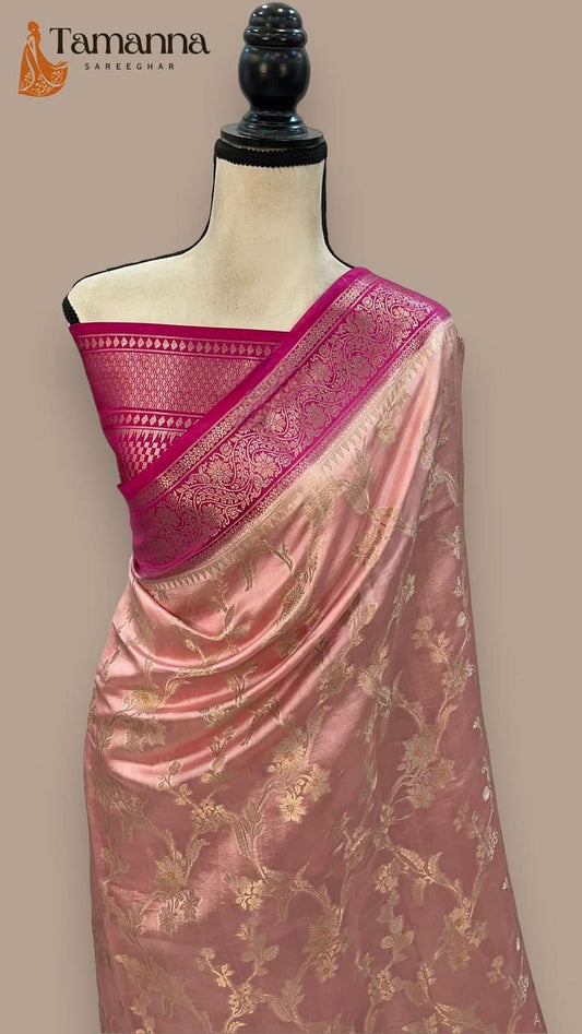 Mango silk Banarasi saree on mannequin, light pink body with magenta border and gold motifs