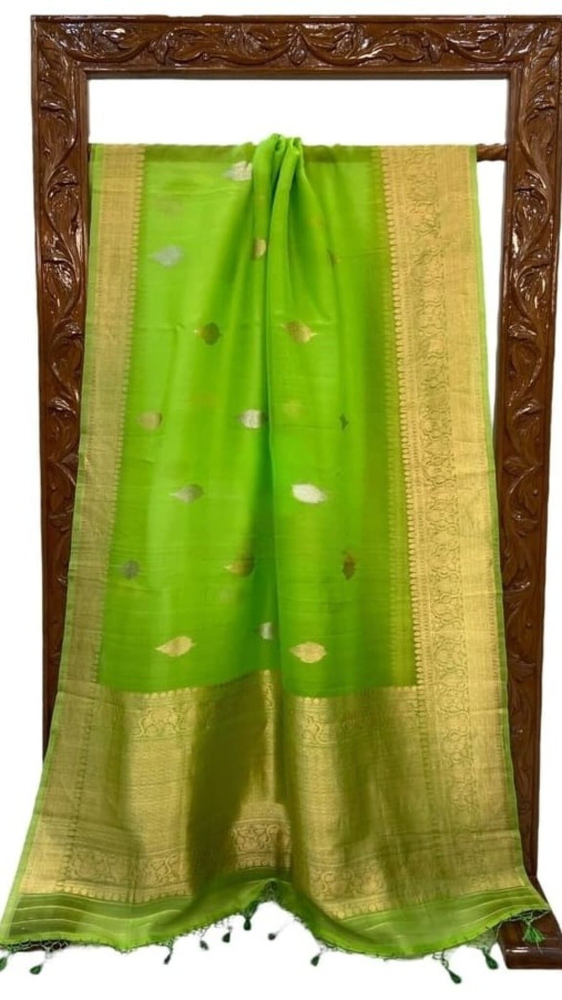 Parrot green saree with gold border, small motifs, and tassel fringe
