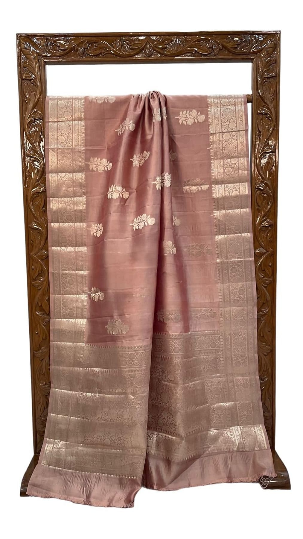 Pastel pink silk saree with gold-toned border and paneled check pattern