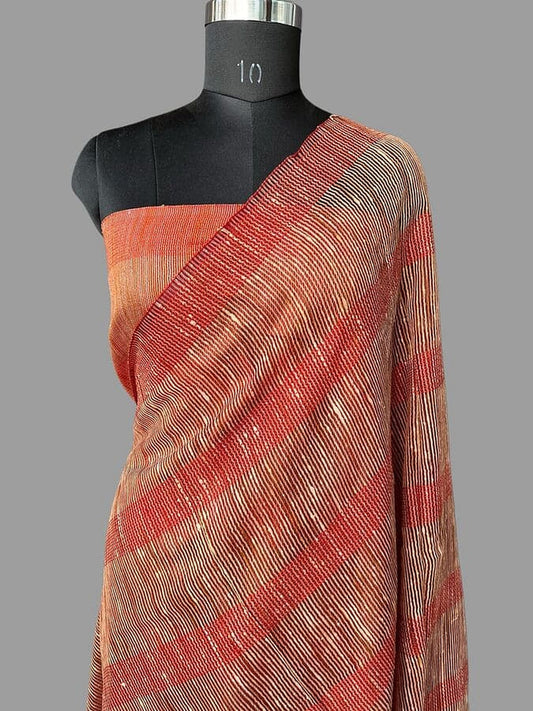 Peach raw silk Banarasi saree drape with red diagonal pattern and gold shimmer