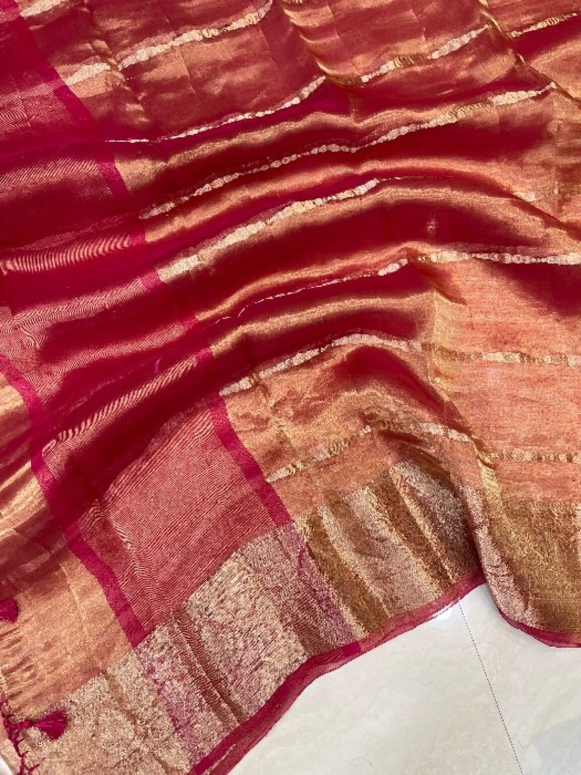 Peach and maroon Banarasi tissue close-up, gold stripes and woven checks