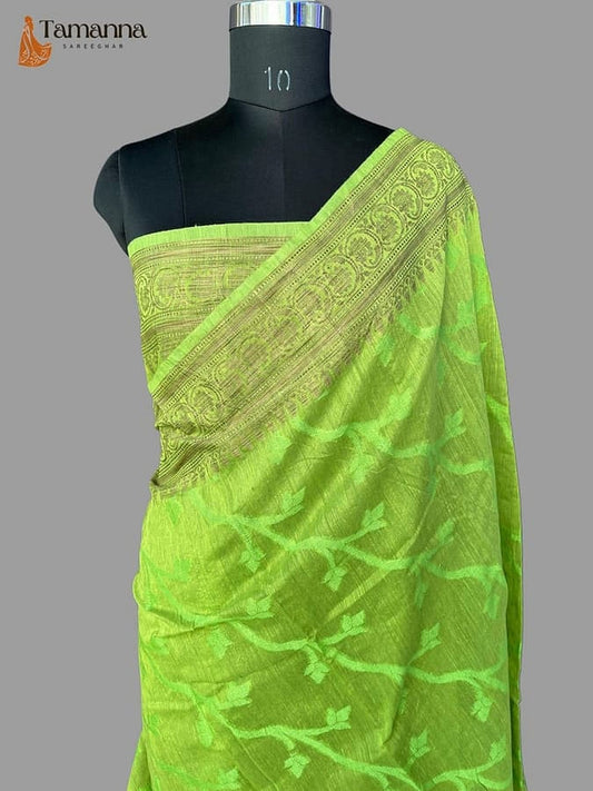 Pure silk saree in bright green with ornate grey border on the pallu