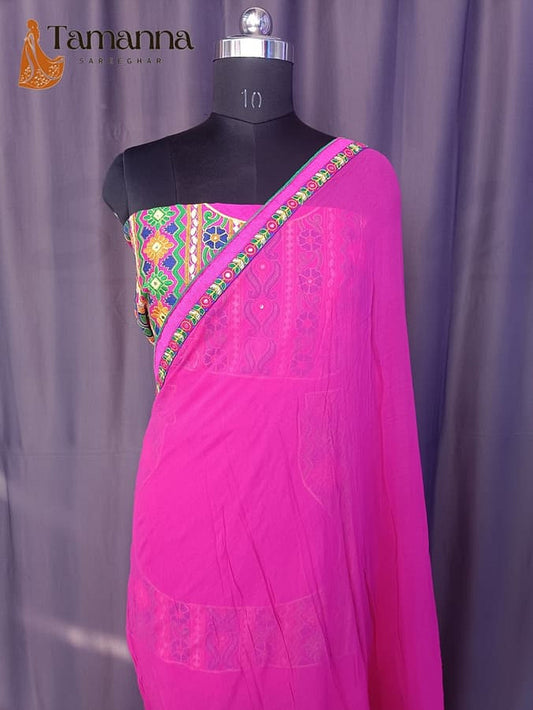 Pink georgette saree with bright multicolor border and embroidered pallu