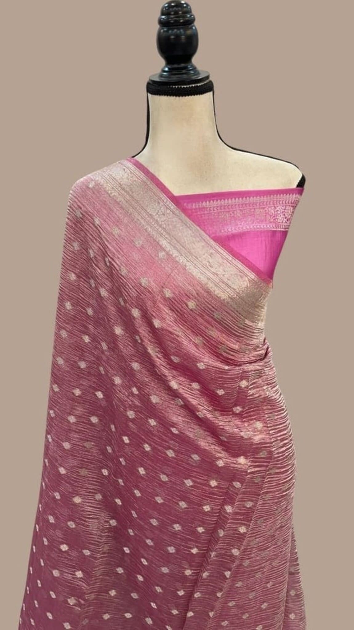 Pink Banarasi tissue saree with gold border, diagonal drape with small dotted motifs