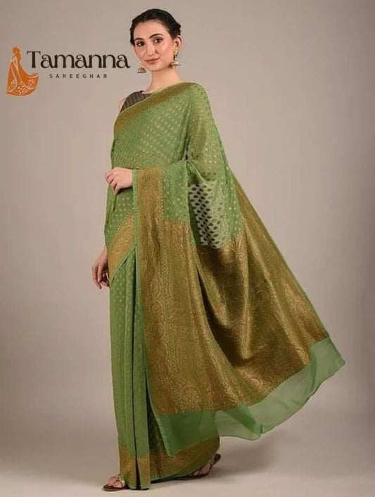 Green saree with gold zari border, front drape with wide pallu end