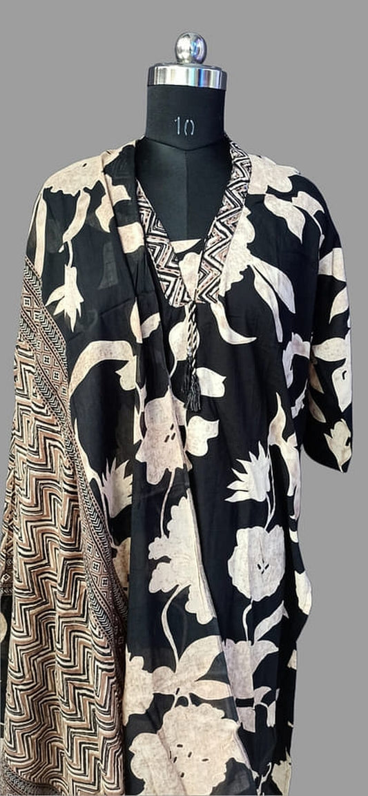 Cotton suit set kurta side view: black with white floral print and V-neck trim