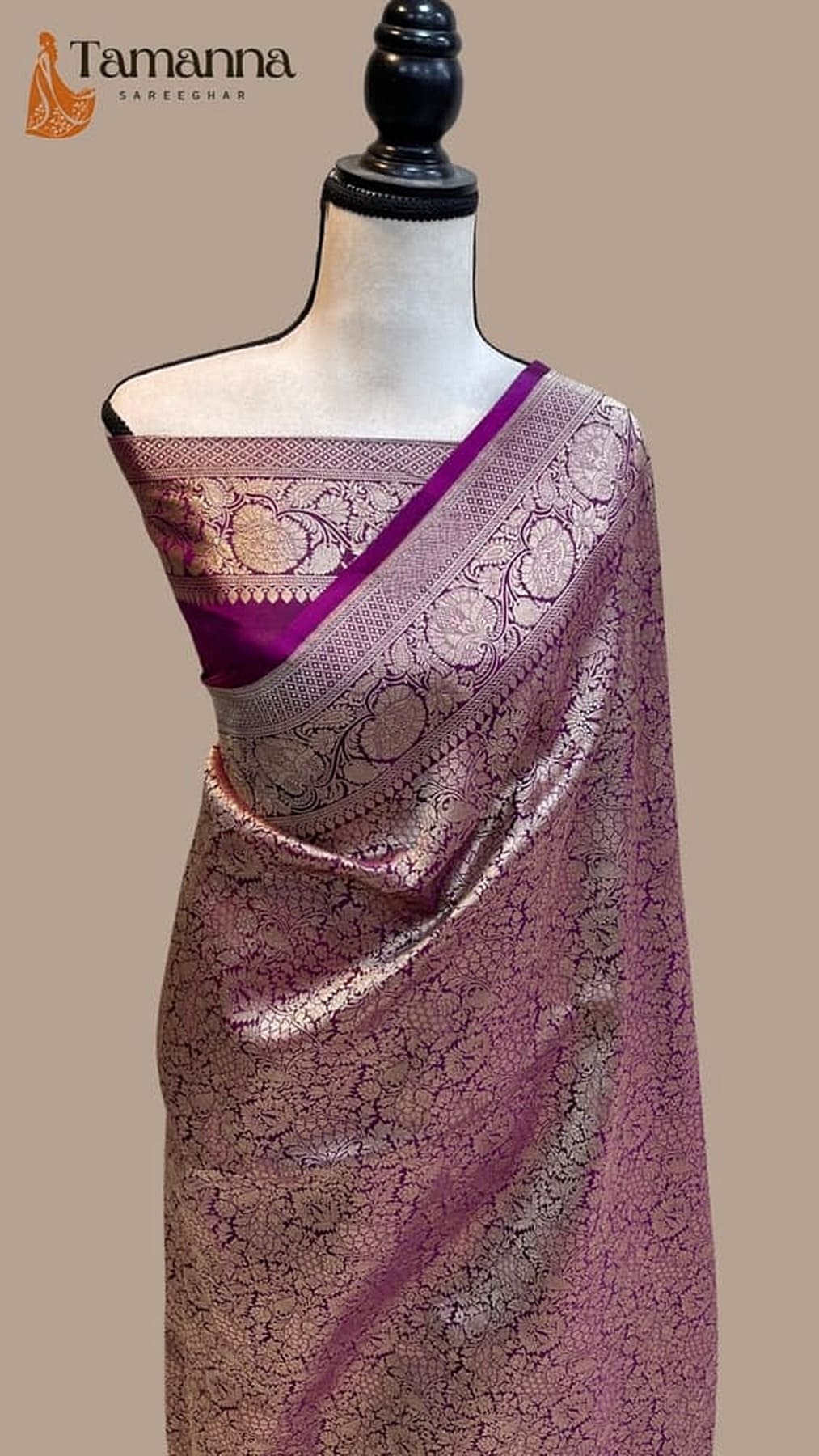 Purple Banarasi silk saree with patterned fabric and zari border