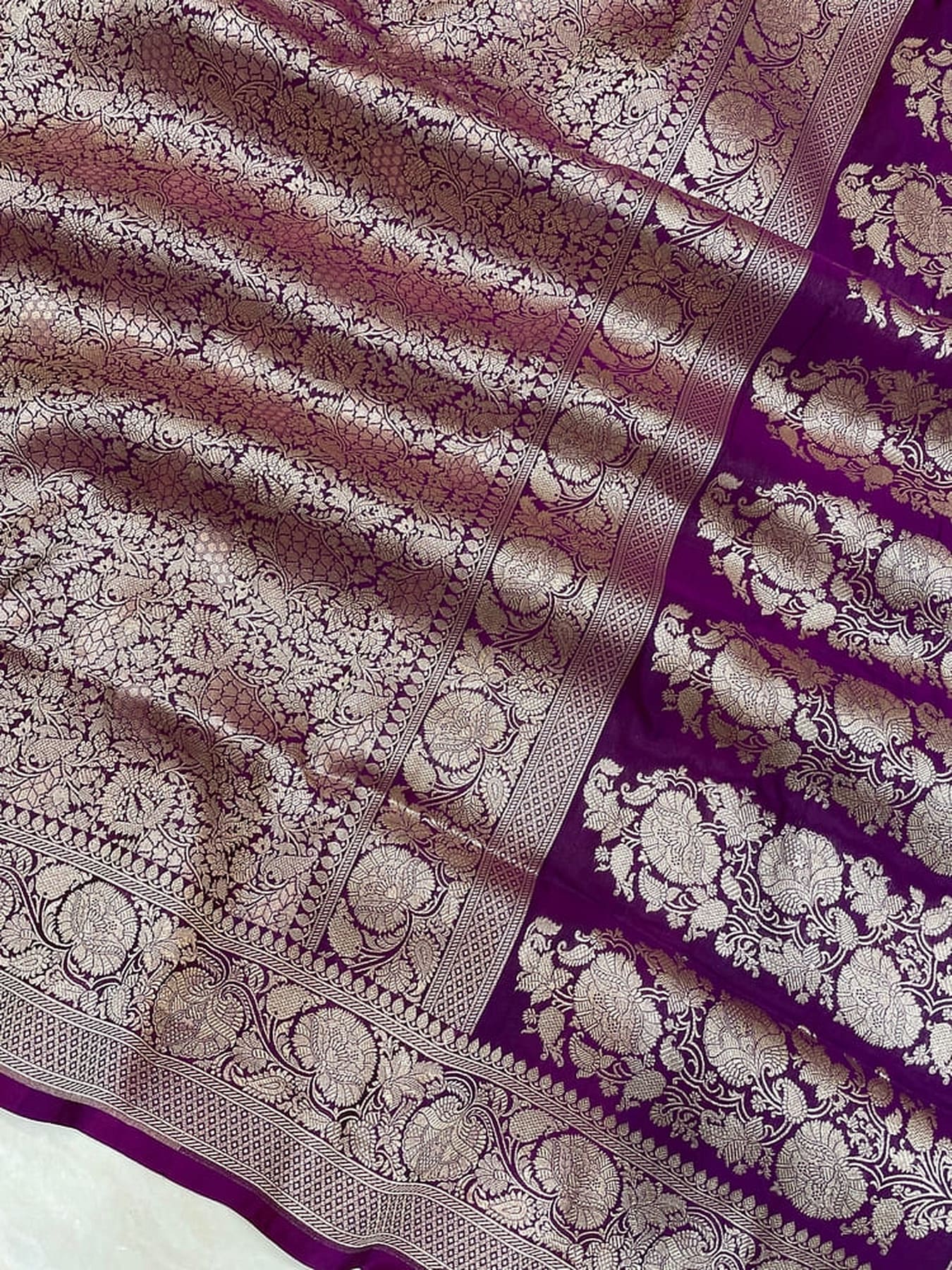 Purple and dark purple Banarasi silk zari stripe border with floral motifs
