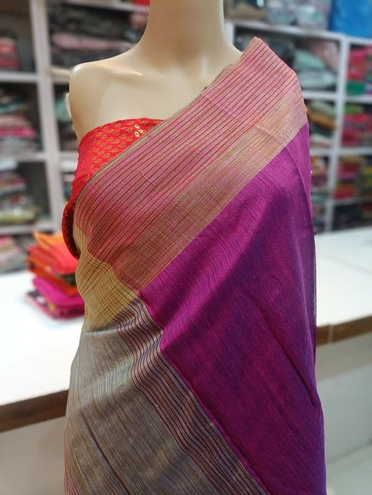 Purple silk saree with pinkish-gold border, draped pallu on mannequin