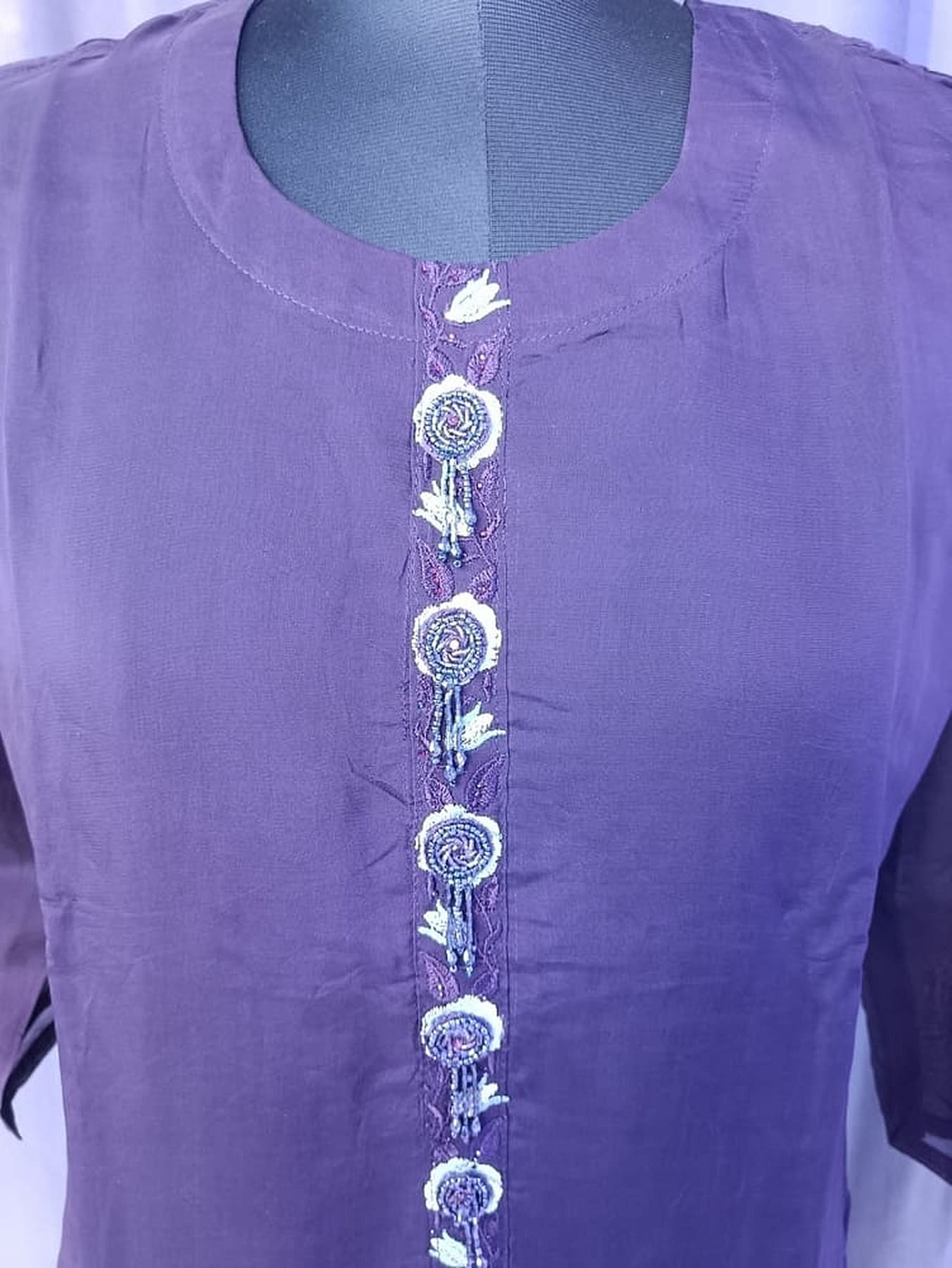 Purple kurta front yoke with vertical white floral embroidery