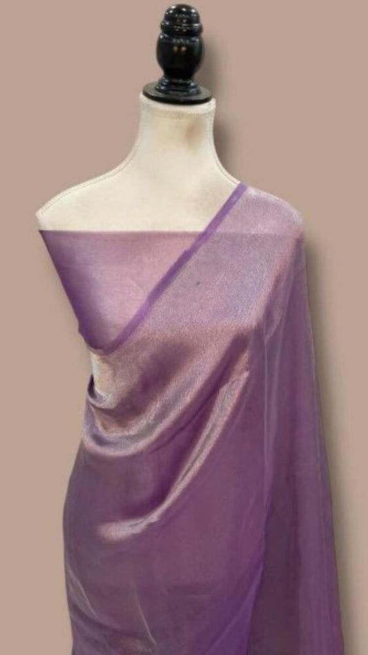 Purple Banarasi saree draped on mannequin, cream blouse, purple border