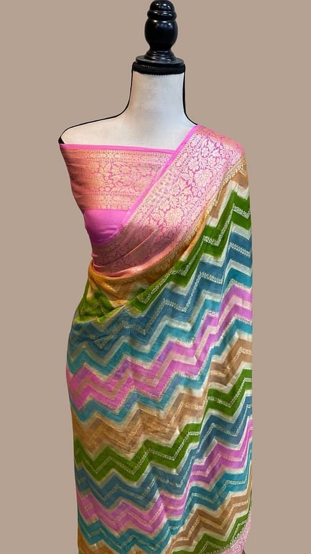 Multicolor chevron saree with pink pallu and gold woven border detail