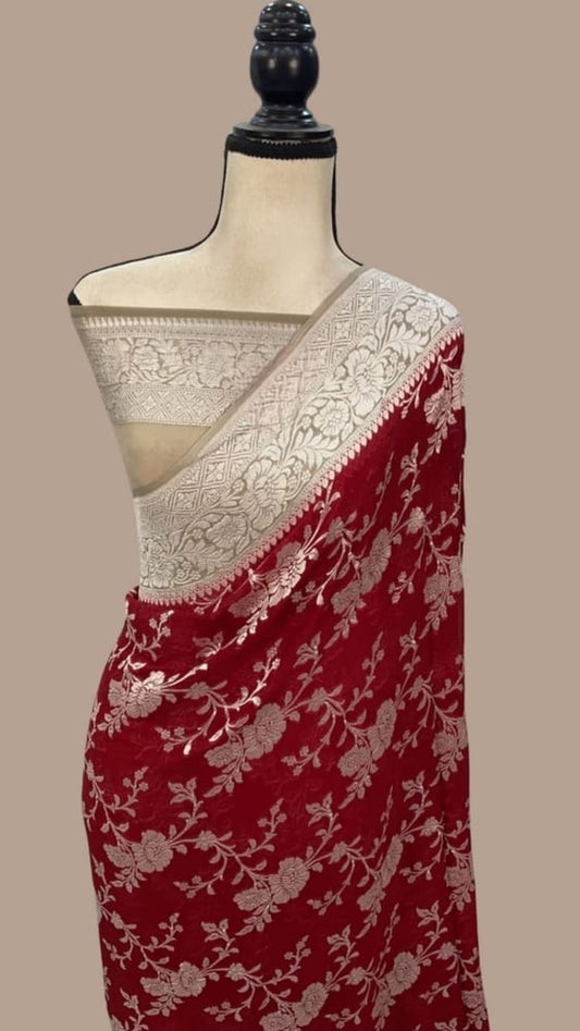 Red floral Banarasi saree with ivory pallu panel and silver zari border