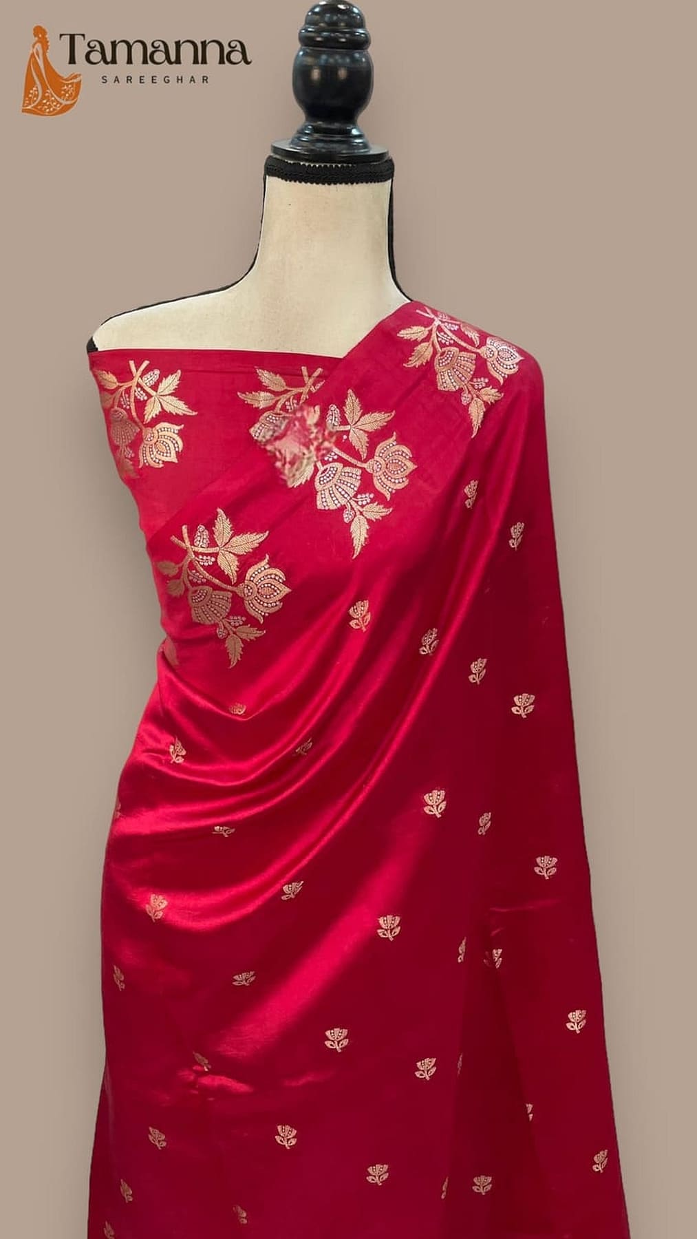 Red silk saree featuring gold floral motifs on the pallu
