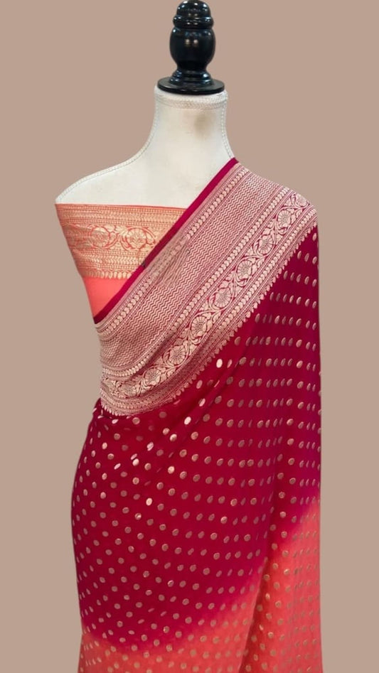 Red saree with pink border and medallion motifs, dotted pallu design