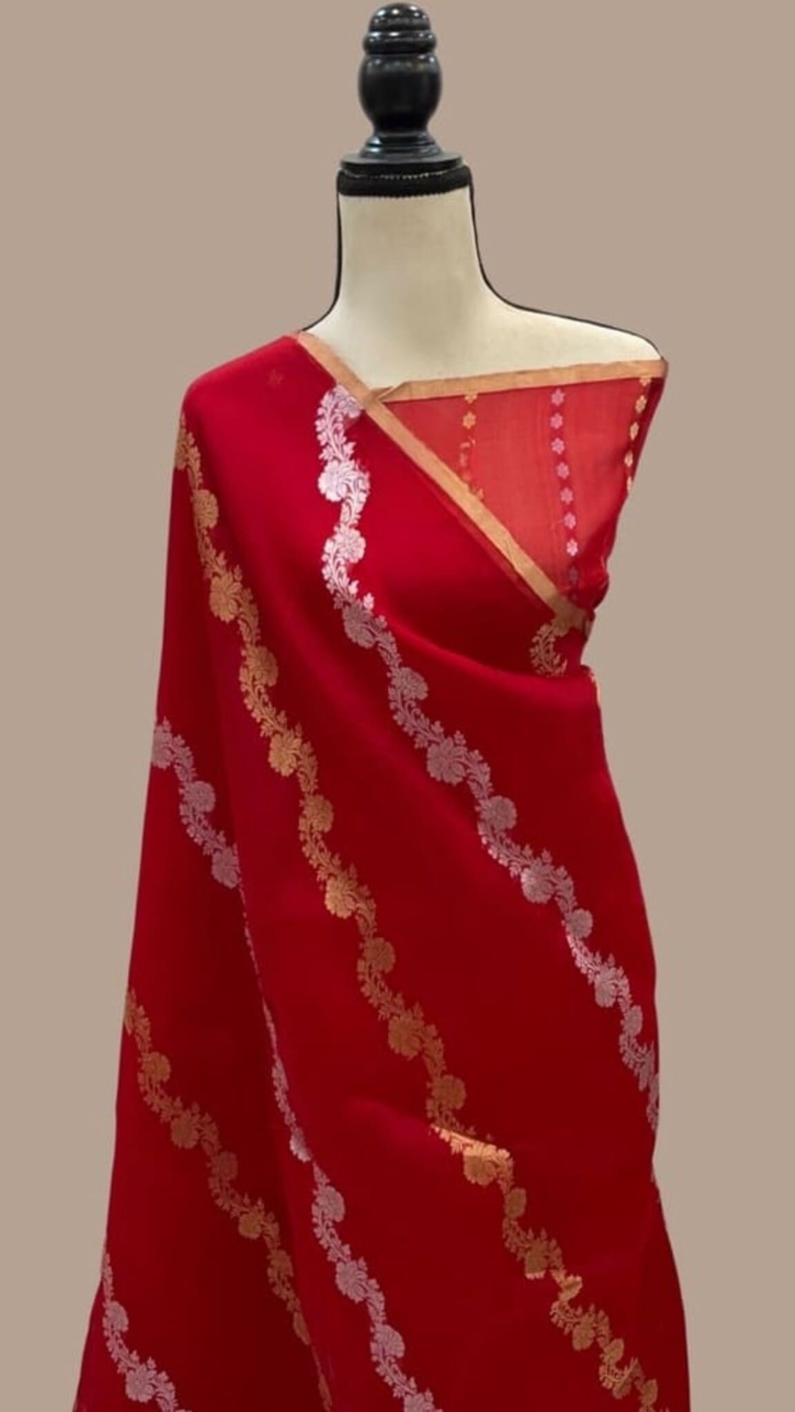 Red Banarasi handloom saree with gold and silver zari drape, off-shoulder pallu