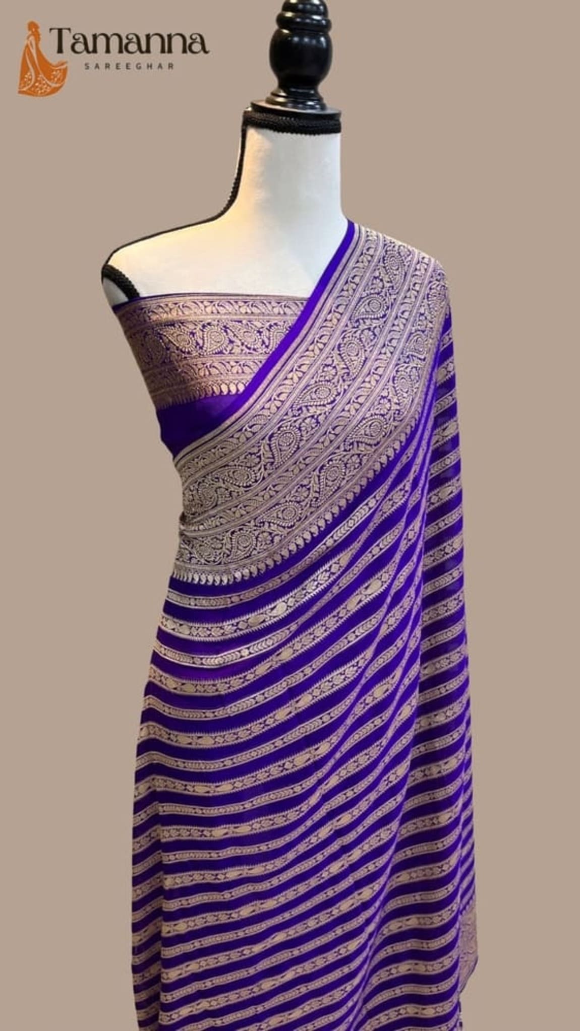Royal blue Banarasi sari on mannequin, khaddi georgette with antique zari pallu border