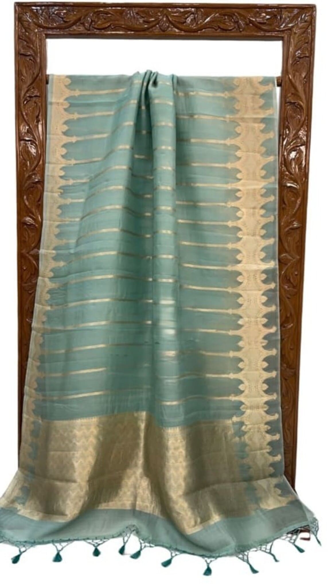 Sea green Banarasi saree with gold border, woven stripes, and tassel fringe