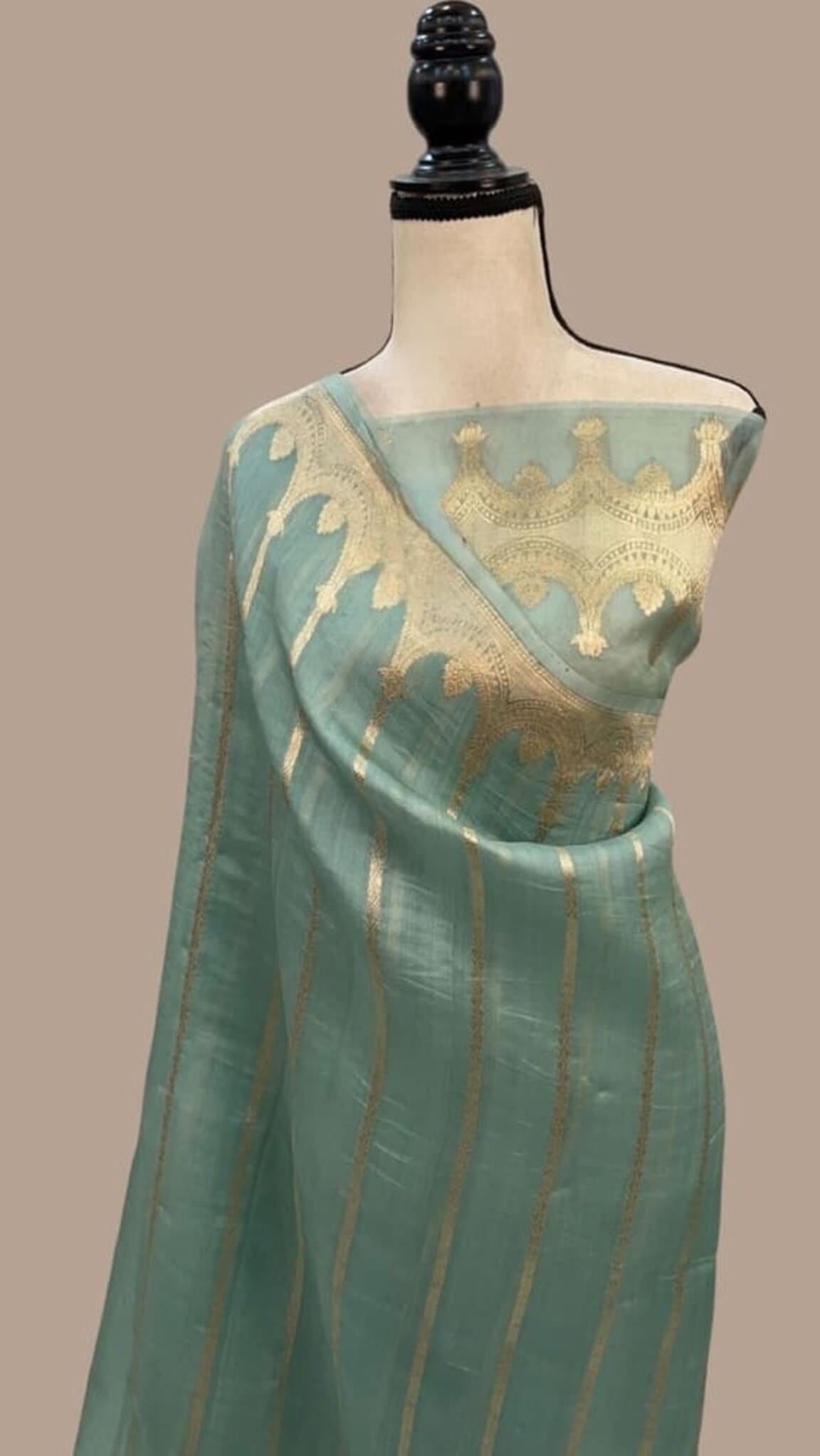 Sea green Banarasi handloom saree with gold zari woven pattern and drape