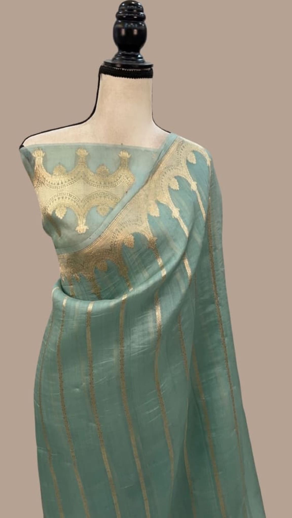 Sea green Banarasi handloom saree with gold pallu and woven motifs