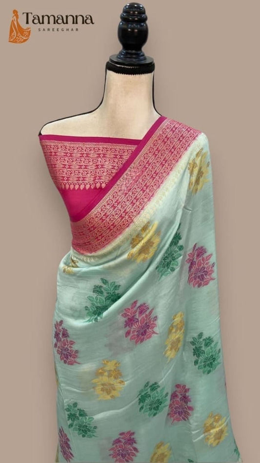 Sky blue pure butter crepe Banarasi saree with pink pallu border and floral motifs