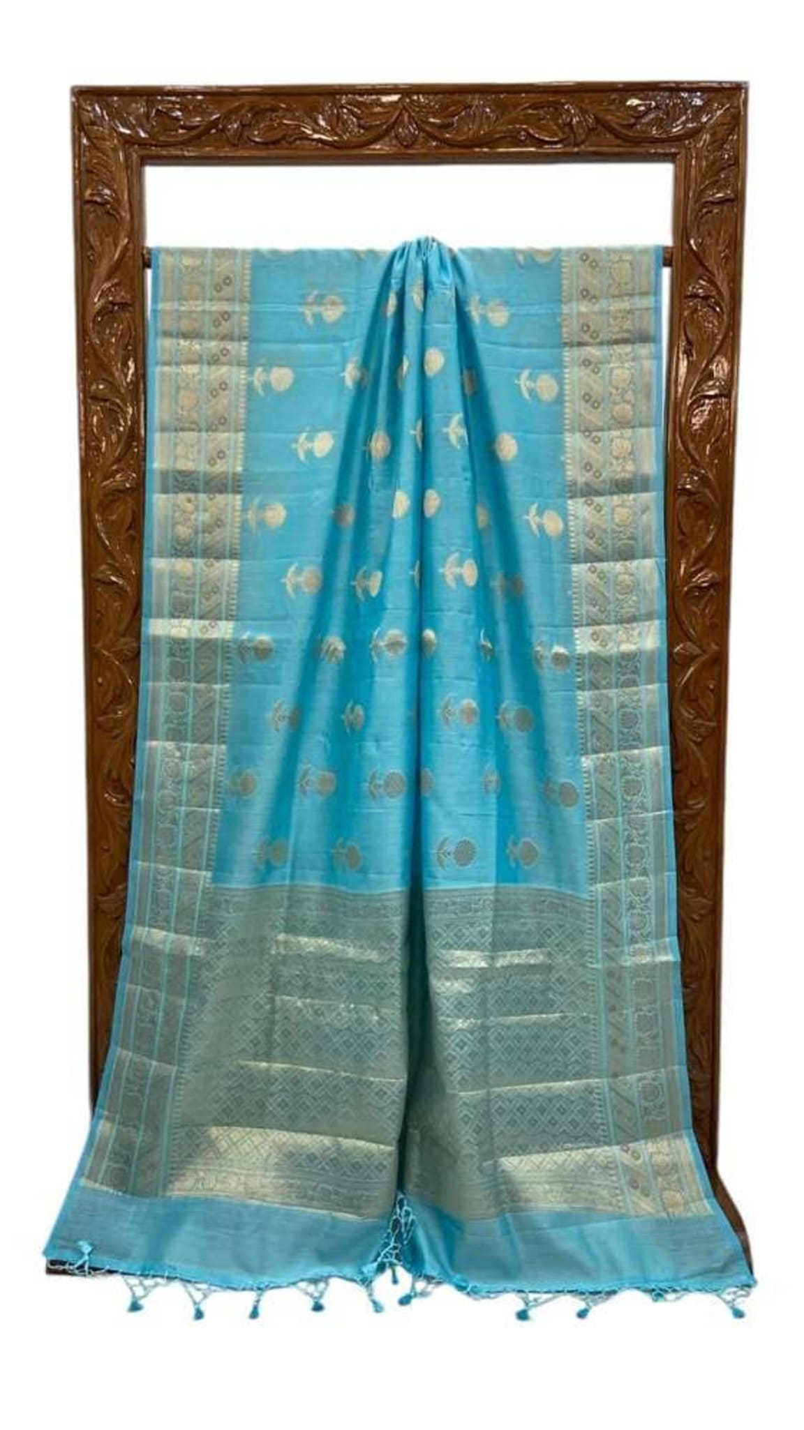 Sky blue cotton Banarasi saree with wide gold border, allover bird motifs & tassels