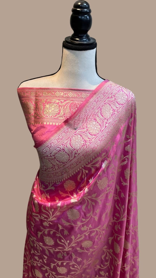Banarasi silk saree drape on mannequin, deep magenta with ornate zari pallu