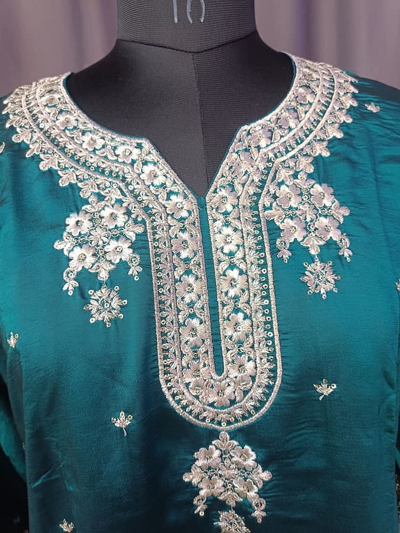 Teek blue silk kurta chest and neckline with detailed silver floral embroidery