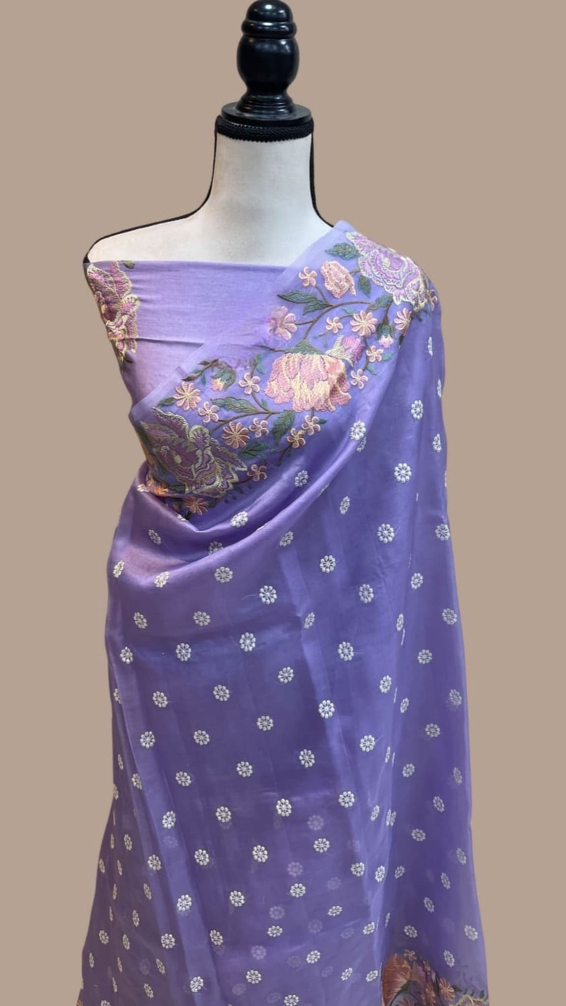 Lavender organza saree with small gold dot motifs and embellished floral border