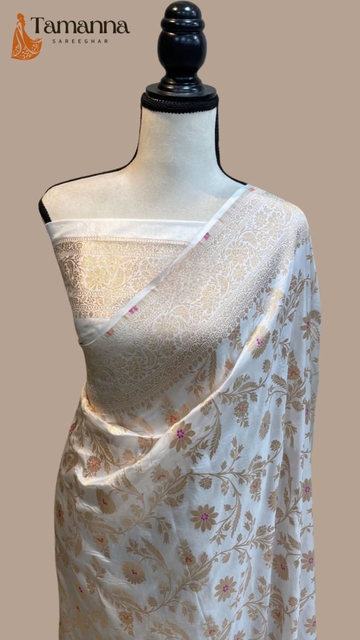 Ivory silk saree with floral jaal, pastel meenakari work on drape, woven border