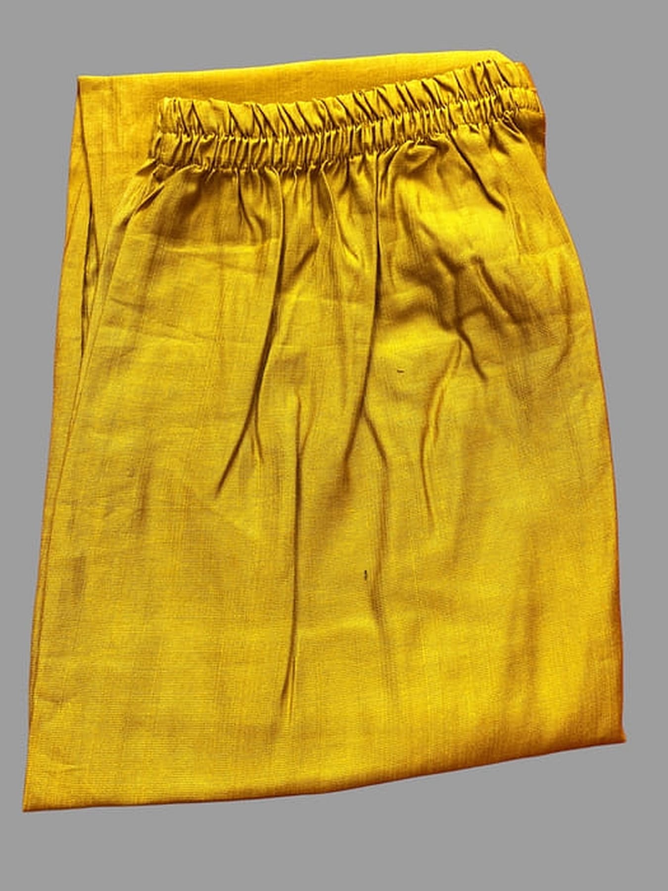 Yellow rayon drawstring skirt-style pants with elastic waistband